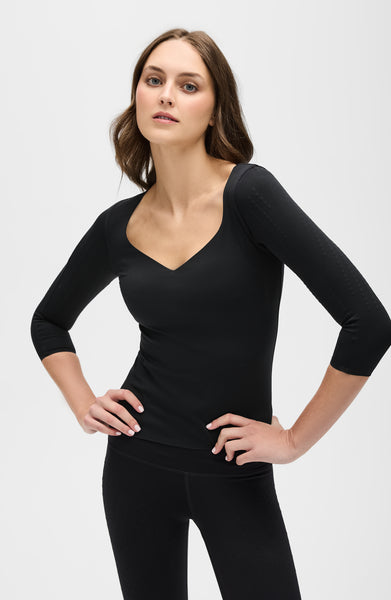 Iconic Top MicroPerle® Manches 3/4 en noir, avec MicroPerle® sur le haut des bras et le dos pour stimuler votre système lymphatique