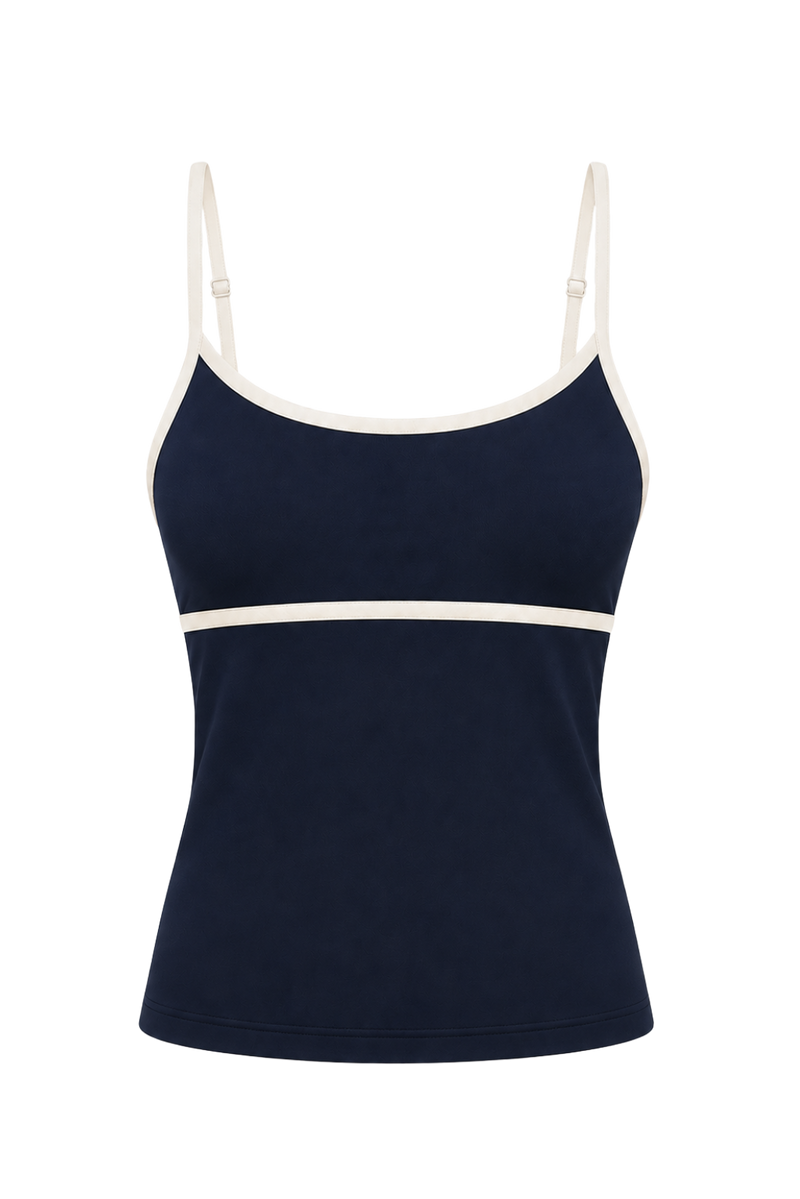 Image produit détourée du débardeur Monte Carlo bleu marine et crème. Cette silhouette élégante présente de fines bretelles ajustables, un décolleté arrondi et des détails contrastés crème qui soulignent les lignes du modèle pour un style balnéaire chic et intemporel.